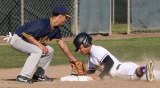 Lemoore's Abel Garza slides into third, one of his two triples against visiting Sunnyside High on Tuesday. The Tigers travel to Firebaugh Friday for a non-league game. The Tigers won the game 8-1.